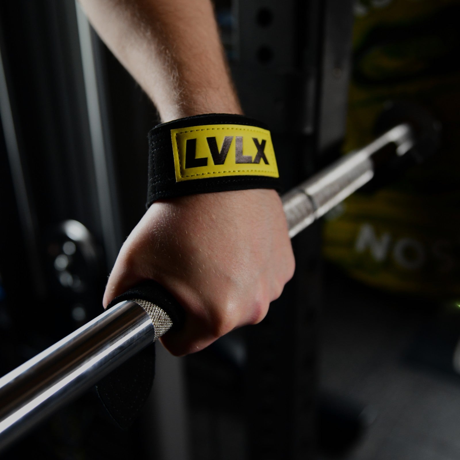 LVLX Leather Lifting Straps wrapped around wrist during RDL grip support